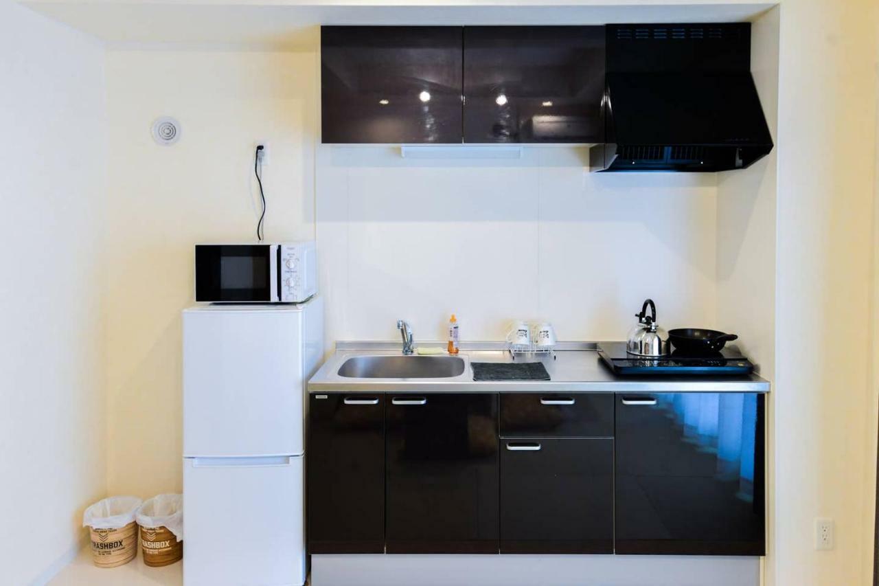 Momo Premium 702 Apartment Sapporo Bagian luar foto